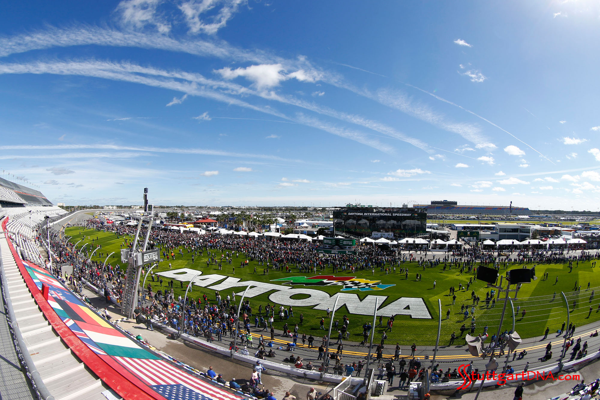 Daytona track - fisheye view. Credit: PMNA Porsche 2015 Daytona 24 hours: A fisheye-lens view of the Daytona track, with Daytona lettering on grass in the in-field. Credit: PMNA