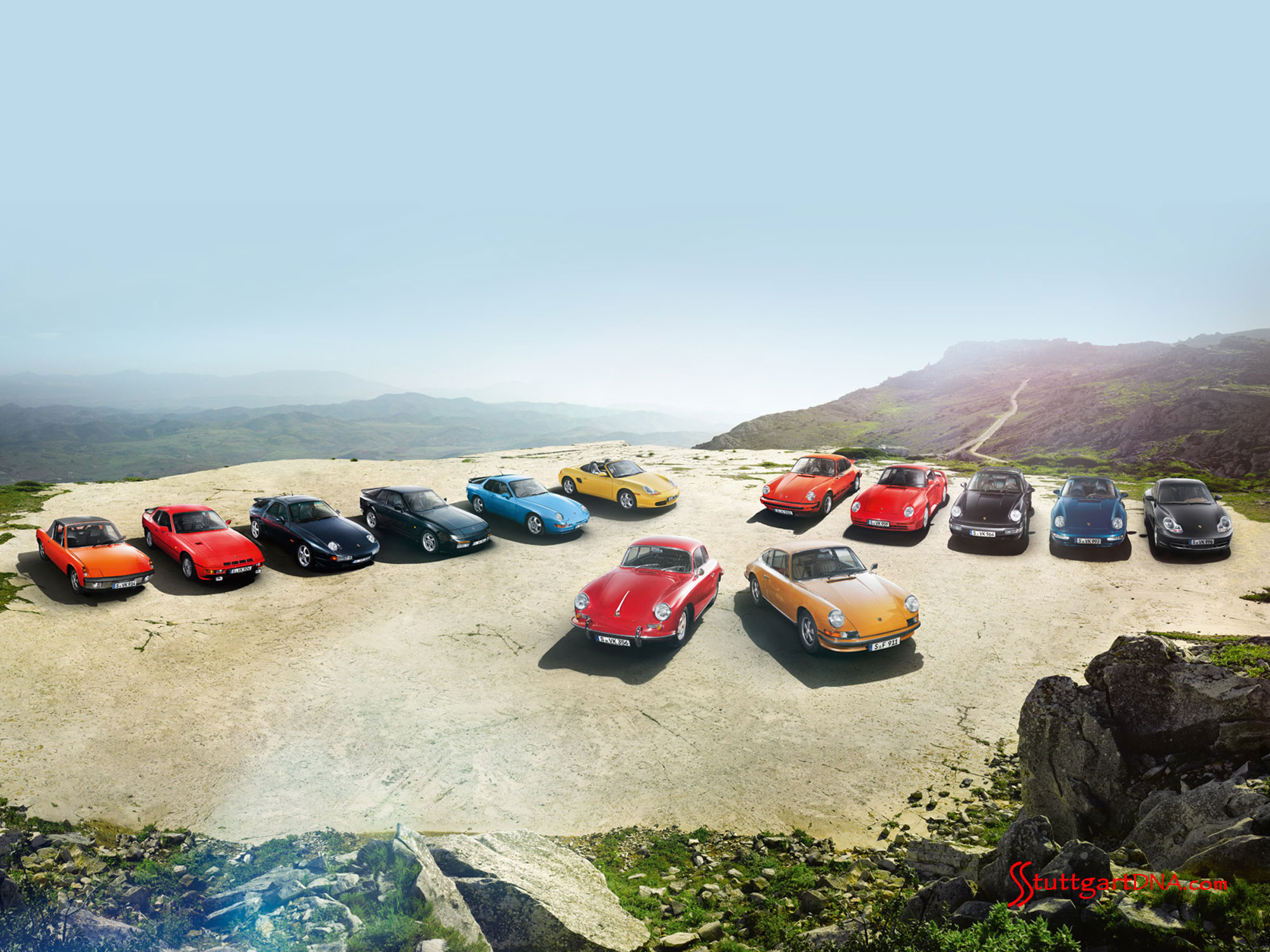 Porsche Classic Centers opening worldwide Porsche Classic Centers opening worldwide: Porsche classics -- from 356s and 911s, to 928s, 944s and Boxsters -- are seen parked on a high plateau overlooking picturesque mountainous terrain in the distance. Credit: Porsche AG