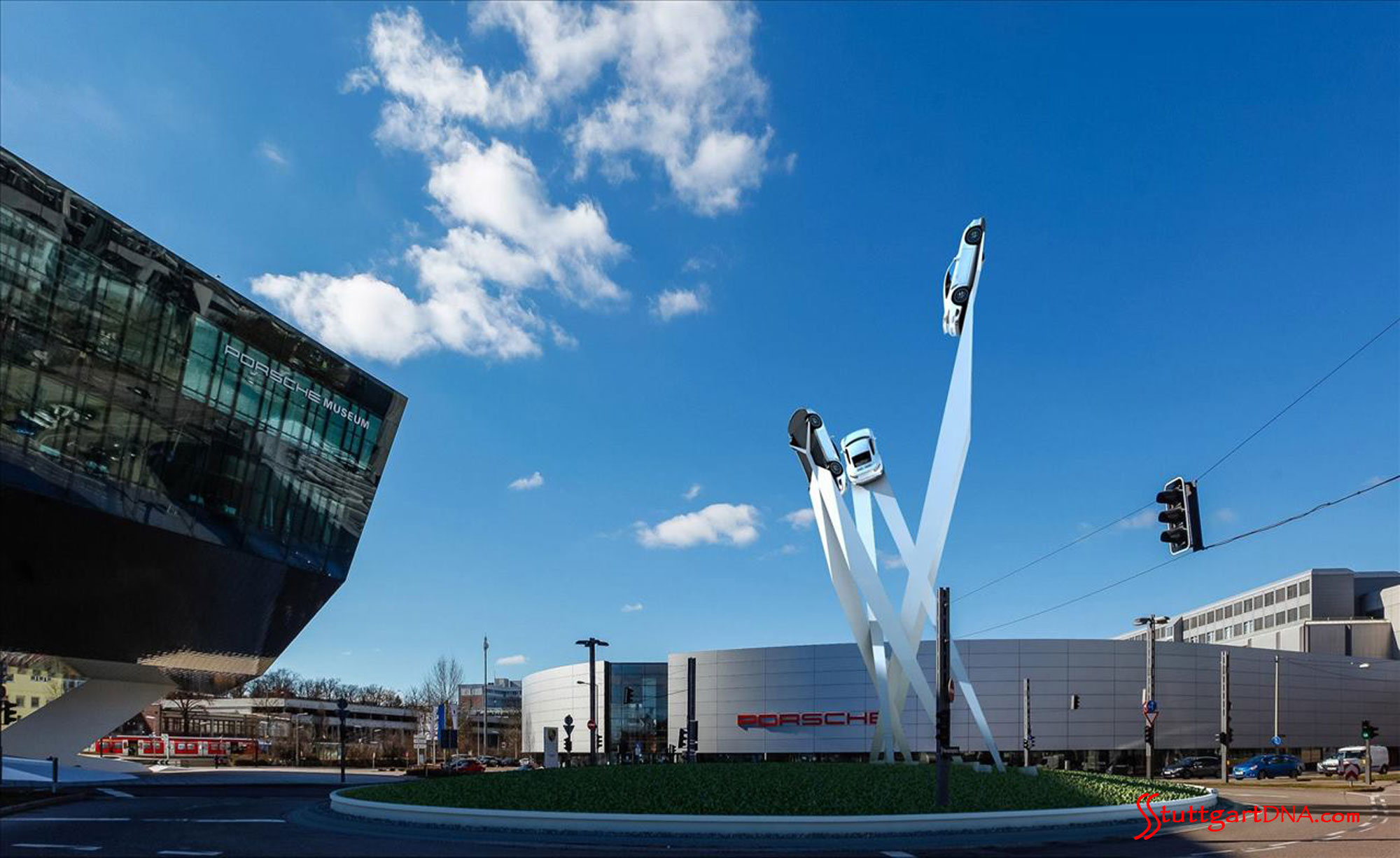 Porscheplatz, Porsche Museum and sculpture draft by day. Credit: Porsche AG Stuttgart Higher Court dismisses US hedge-fund claims. A wide-angle daytime shot of Porscheplatz, the Porsche Museum and the towering draft of a centerpiece sculpture, Stuttgart. Credit: Porsche AG