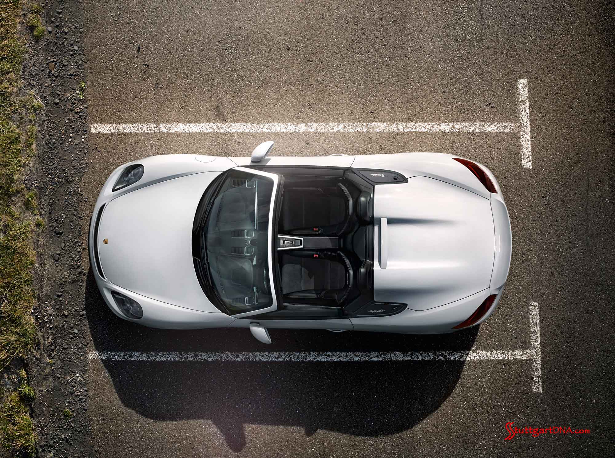 Porsche SE records 2015 Q1 group profit Porsche SE records 2015 Q1 group profit. Boxster Spyder World Premiere: The white Boxster Spyder is seen from a dramatic overhead view, at rest in a parking lot's lined space. Credit: PCNA