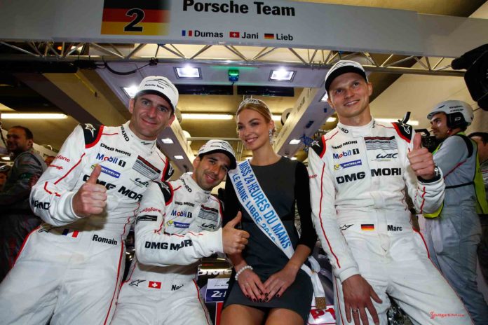 Dumas, Jani and Lieb with Miss 24 Heures du Mans. Credit: Porsche AG Porsche earns 18th Le Mans pole: Dumas, Jani and Lieb with Miss 24 Heures du Mans. Credit: Porsche AG