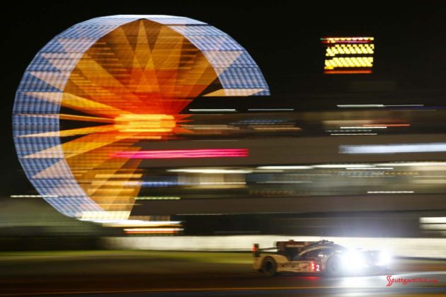 Porsche garners 18th overall win at 84th Le Mans 2016: No. 2 919 with night ferris wheel in bg. Credit: Porsche AG
