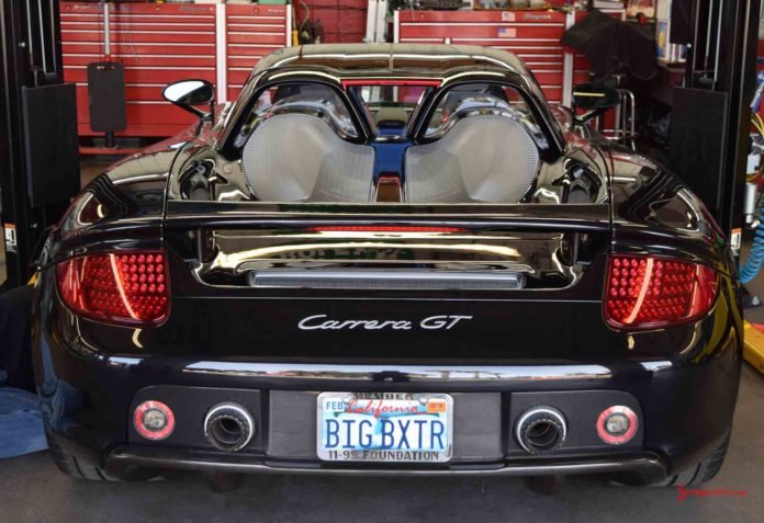 Callas black Porsche Carrera GT rear. Credit: StuttgartDNA Black "Big Boxster" Porsche Carrera GT, rear, at Callas Rennsport during the 2017 Porsche Lit Week. Credit: StuttgartDNA