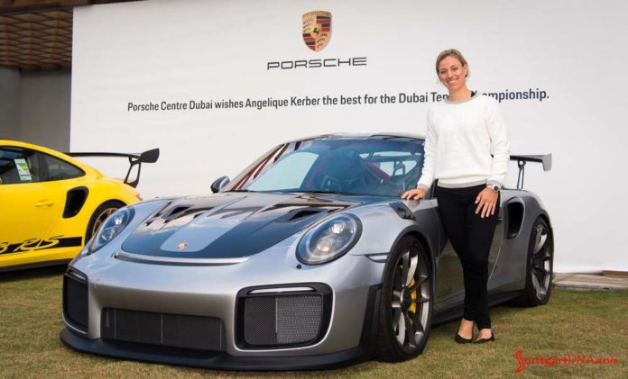 Kerber posing with 911 GT2 RS in Dubai. Credit: Porsche AG Wimbledon champion Kerber tours Porsche Centre Dubai: Seen here is Kerber posing with a silver 911 GT2 RS in Dubai. Credit: Porsche AG