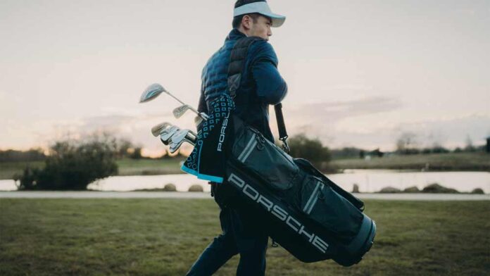 Golfer carrying Porsche Design golf bag. Credit: Porsche Design Depicted here is a Golfer carrying Porsche Design golf bag. Credit: Porsche Design