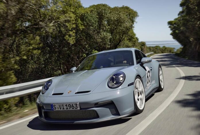 911-S-T, left-front corner, on road. Credit: Porsche AG 911-S-T - Pictured here is a 911 S/T seen from its left-front corner, on a mountain road. Credit: Porsche AG